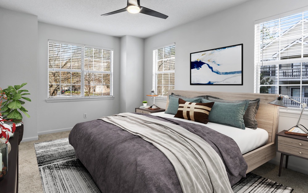 Bedroom with natural lighting and high ceilings